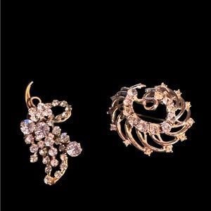 Two crystal brooches